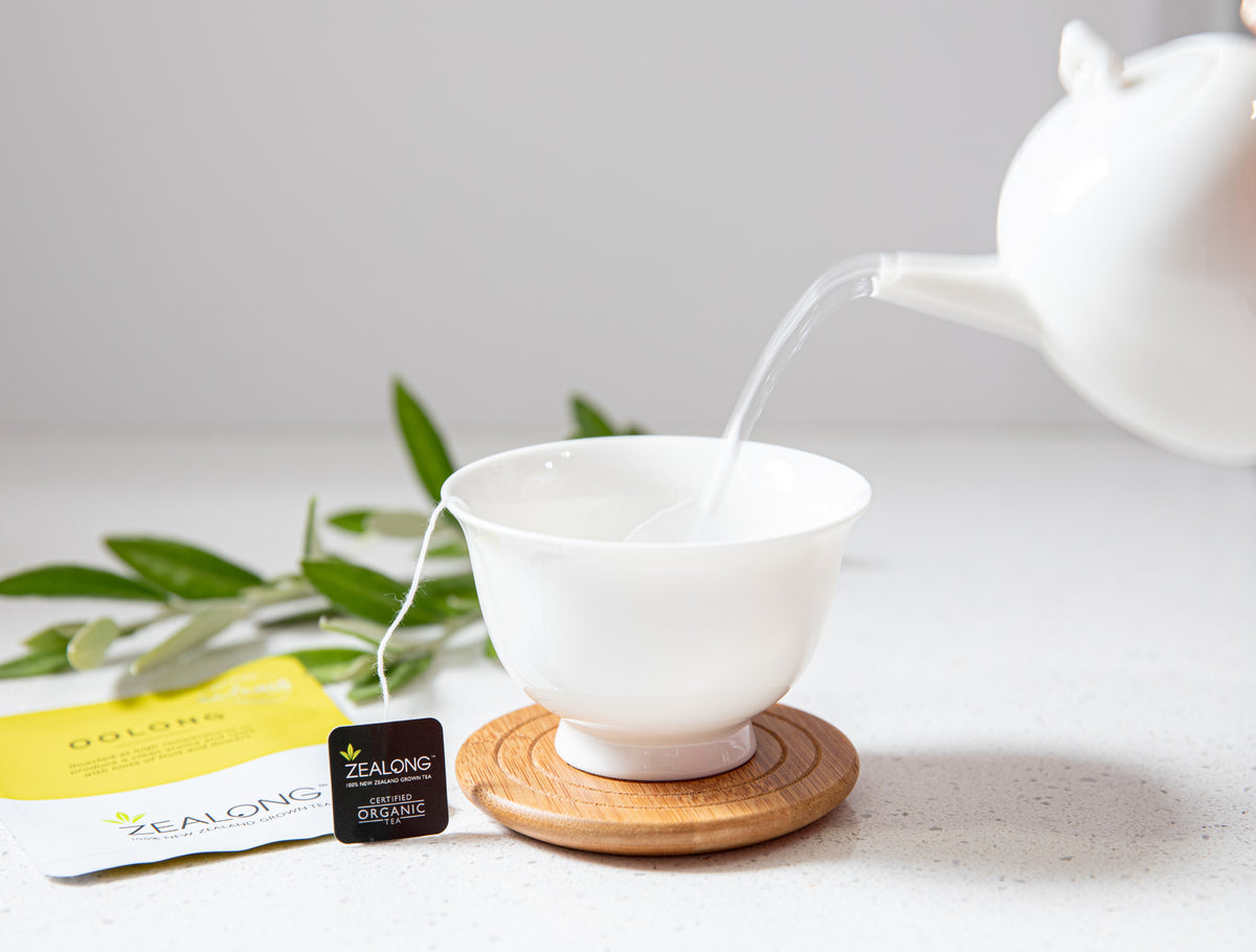 Poorung Tea Pouring Tea High Tea At Bistro Du Midi | New Garden View Tea Service
